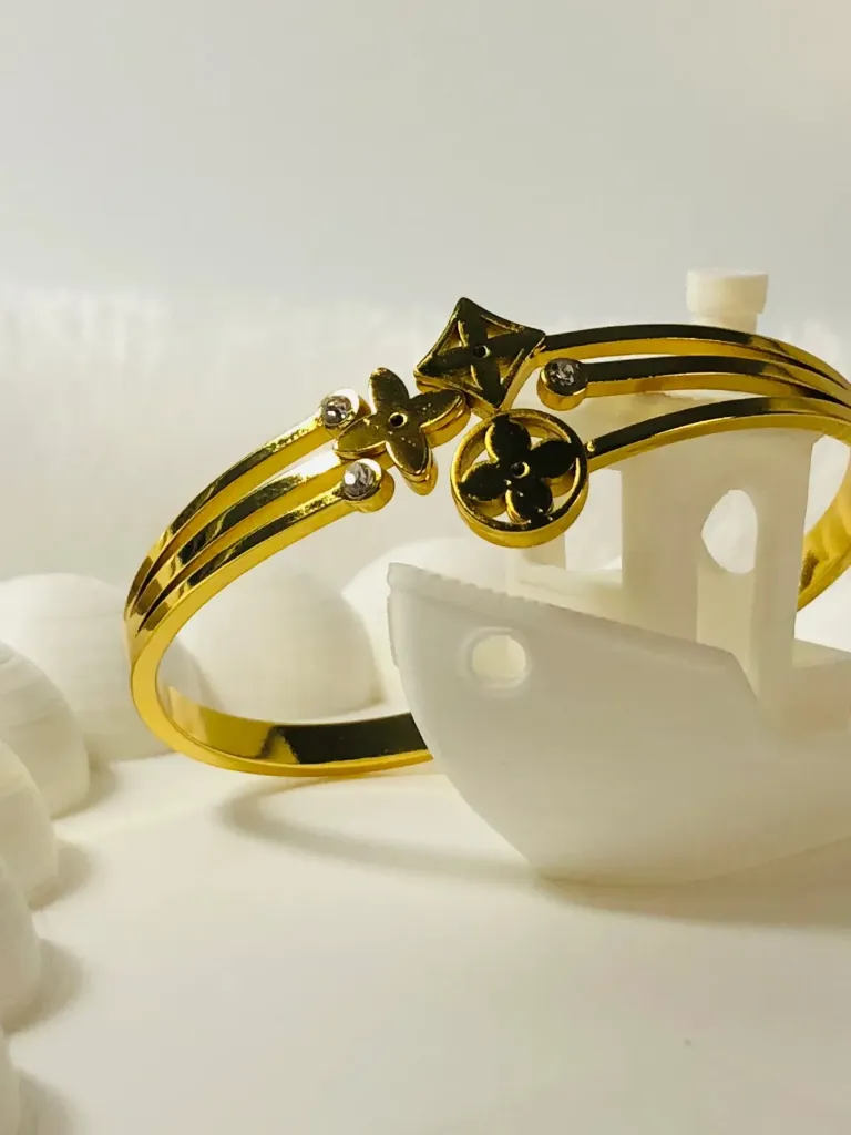 Triple floral glow bangle